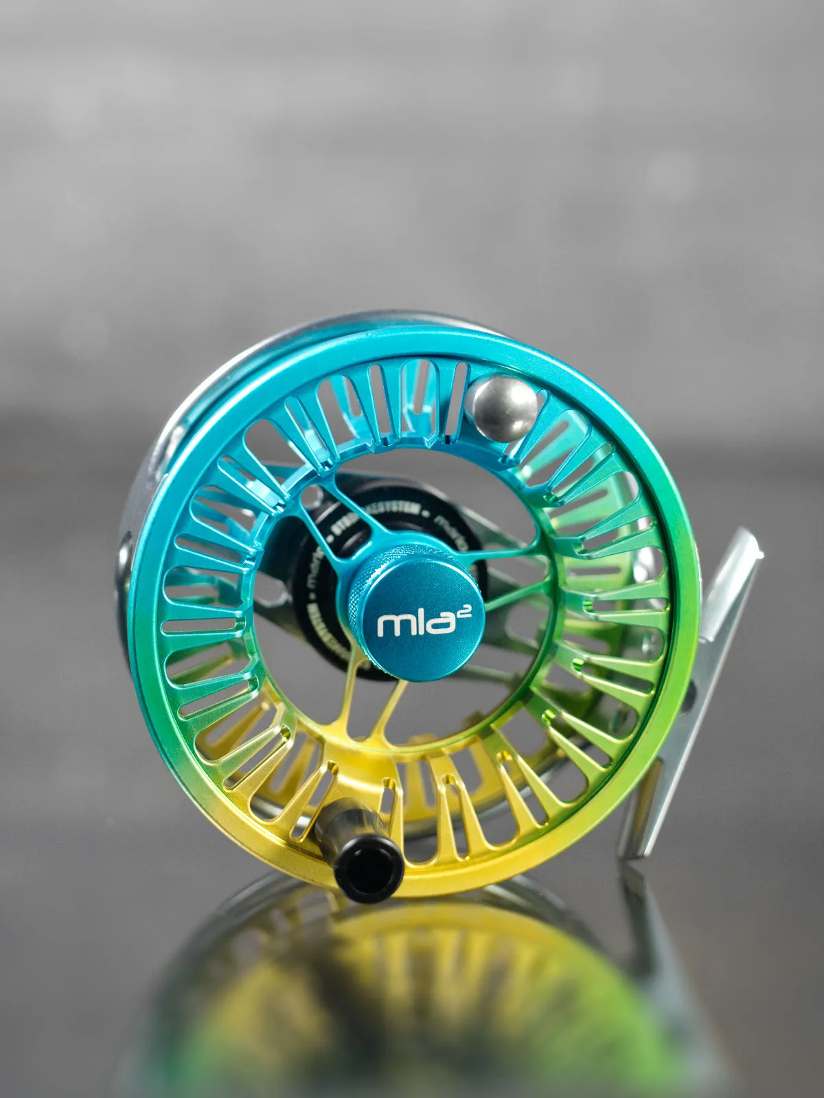 Marlo Flyfishing Marlo Mla² Fliegenrolle Titan/Blue-Gold-Fade 4 Marlo Flyfishing Marlo Mla² Fliegenrolle Titan/Blue-Gold-Fade – Bild 2